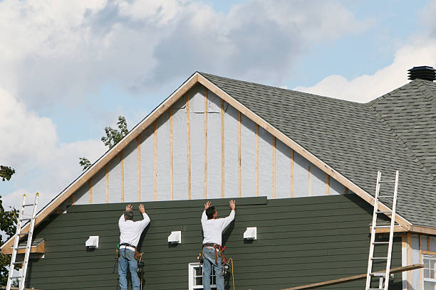 Professional Siding Replacement technician working in Saint Paul Park, MN